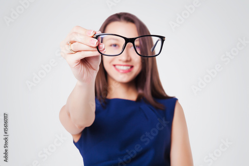 Beautiful young woman with glasses