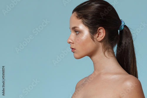 Fashion portrait of young beautiful girl with natural make up.