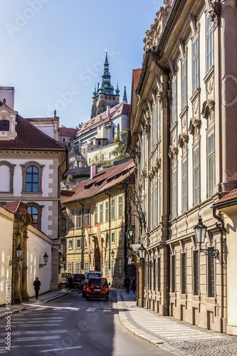 View to Hradcany Castle from the side of the street, located in the "Lesser town" district . The Metropolitan Cathedral of Saints Vitus . Area of the Old City. Prague, Czech Republic.