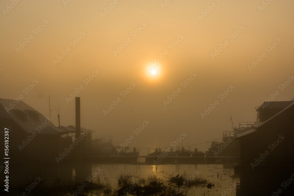 Misty winter sunrise over the river