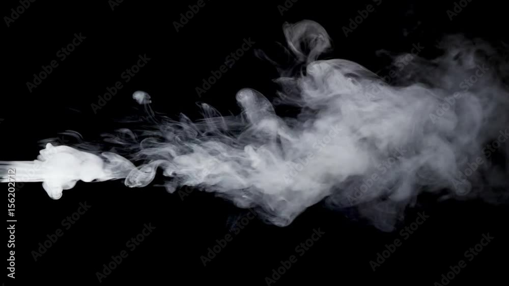 Smoke steam on black background in slow motion.
