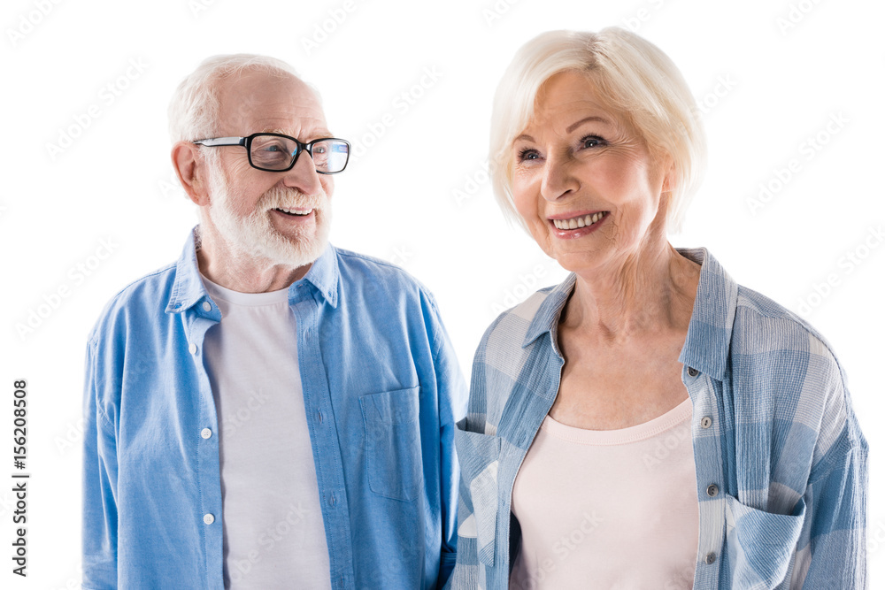 portrait of happy senior couple isolated on white in studio portrait of happy senior couple isolated on white in studio