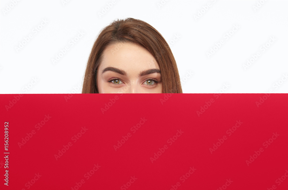Girl hiding behind cardboard Girl hiding behind cardboard