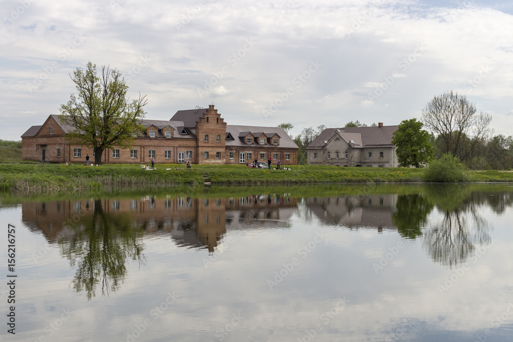 Old buildings are displayed in a pond in Minsk Old buildings are displayed in a pond in Minsk