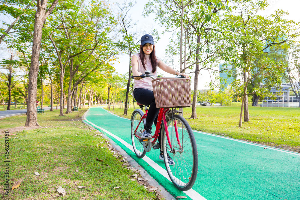 Biker women enjoy summer vacation in city park