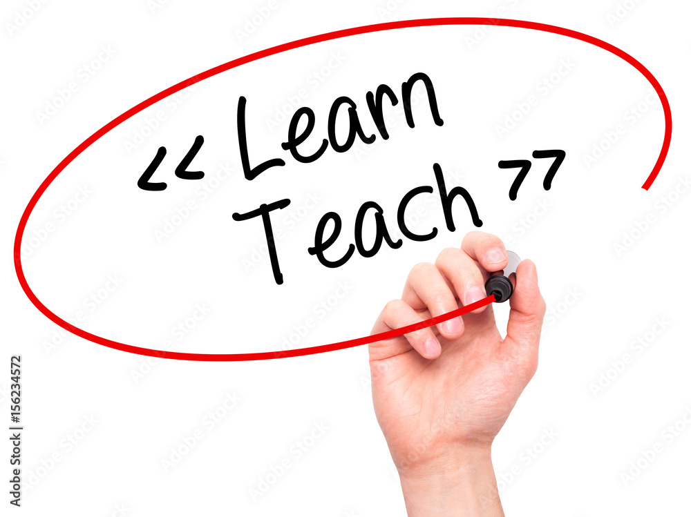Fototapeta premium Man Hand writing Learn - Teach with black marker on visual screen.