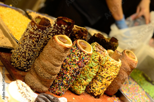 Photography Traditional national Czech sweet street food Trdelnik, is tubes