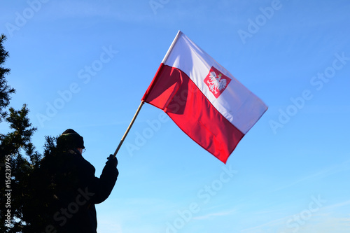 Man with flag of poland photo