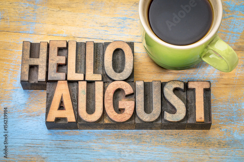 Hello August word abstract in wood type