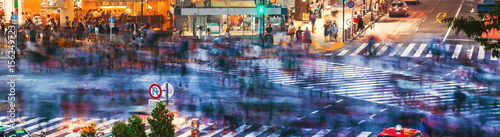 Photography Crowds converge at Shibuya Crossing in Tokyo, Japan