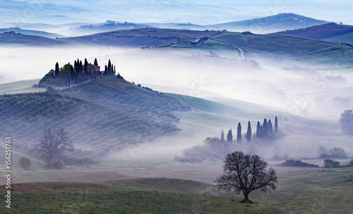 panoramic view of fog at dawn in the green valley