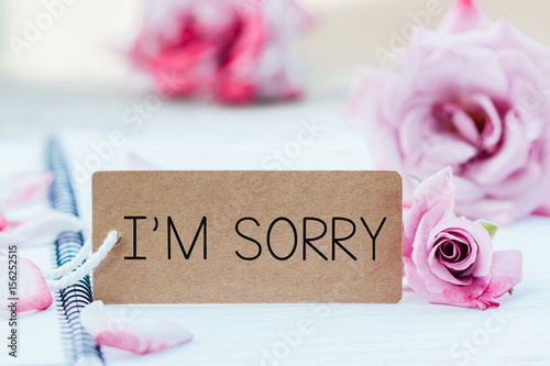 Writing sorry on card