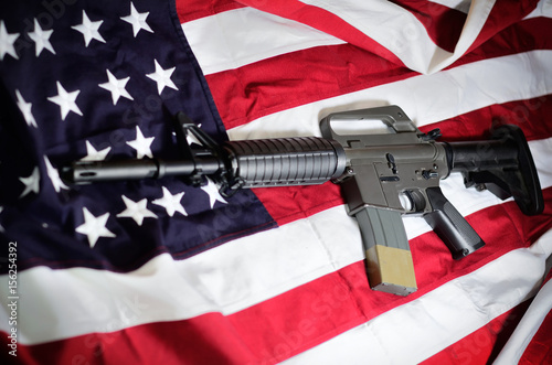 Flag of the USA with rifle photo