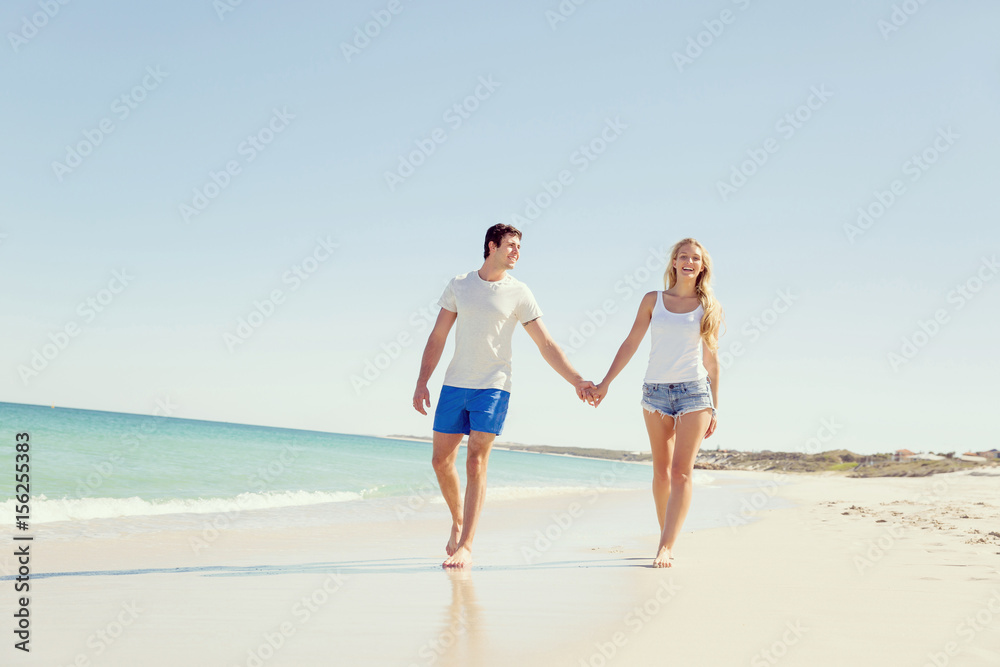 Romantic young couple on the beach Romantic young couple on the beach