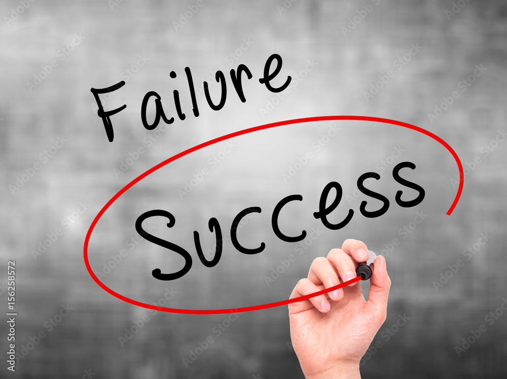 Man Hand writing and choosing, Success instead of Failure, with black marker on visual screen Man Hand writing and choosing, Success instead of Failure, with black marker on visual screen
