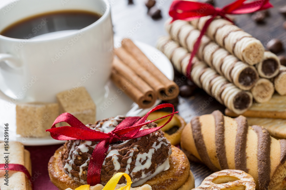 Biscuits and coffee on table