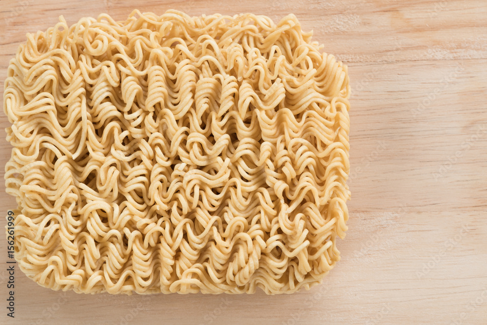 Close-up dried noodles on plank, Instant dried amen noodles Close-up dried noodles on plank, Instant dried amen noodles