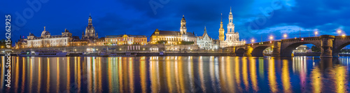 Night view of the historic part of Dresden, city lights reflecting on the River Elbe