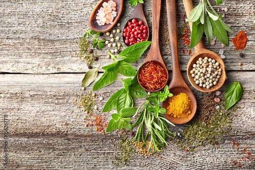 Fototapeta Naklejka Na Ścianę i Meble -  Herbs and spices on a wooden board