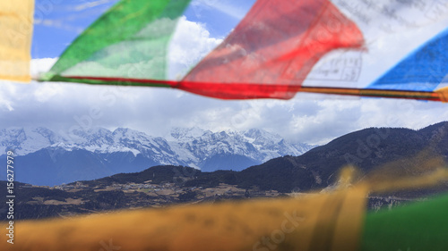 Meili snow mountain and prayer flags, Deqing, Yunnan, China photo