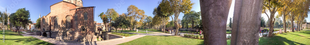 ISTANBUL - OCTOBER 2014: Tourists visit city park. Istanbul attracts 10 million people annually