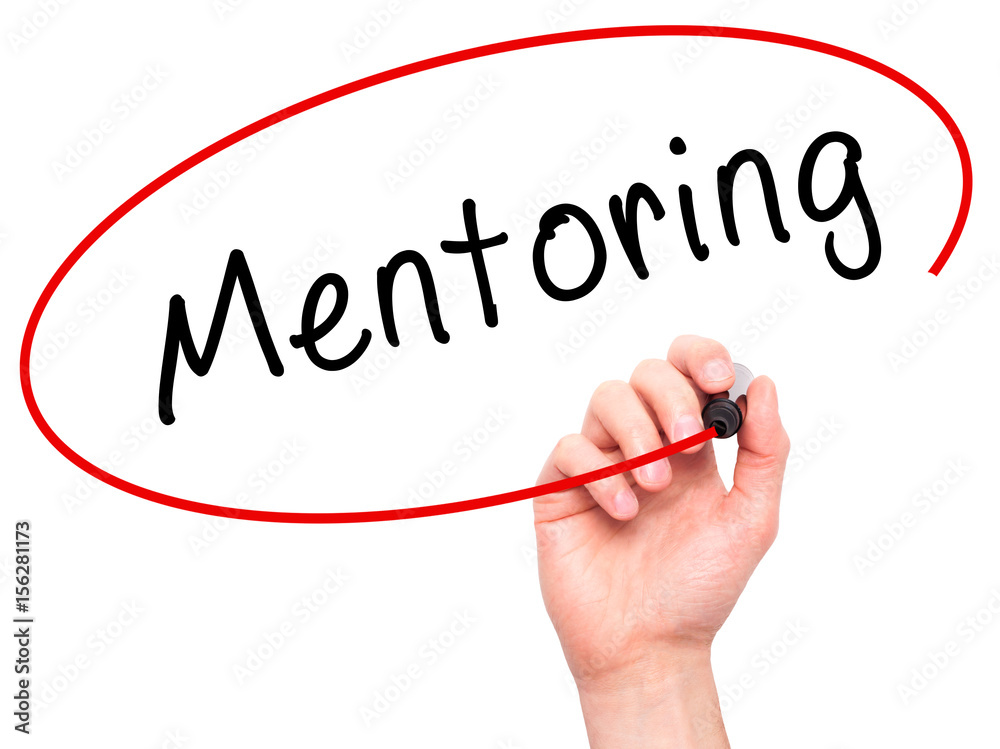 Man Hand writing Mentoring with black marker on visual screen Man Hand writing Mentoring with black marker on visual screen