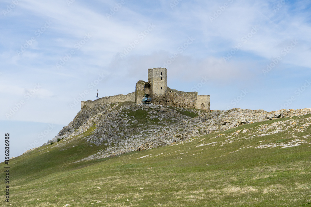 Ruins of ancient Enisala Fortress also referred as Heracleea Fortress on cloudy day in Dobrogea, Romania