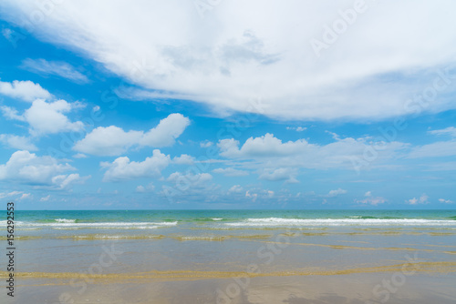 Sunny day on th beach. sea beach ,waves ,cloud and blue sky.