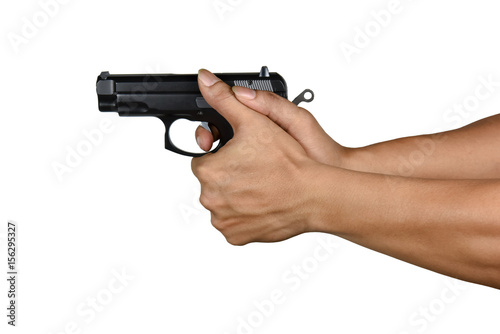 Fotografia a hand with handgun wrong thumb gripping style