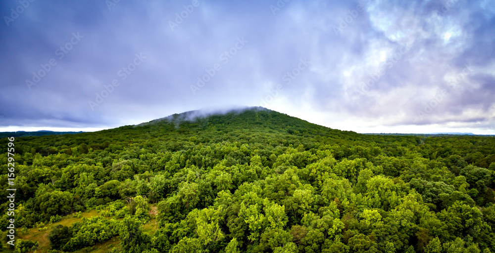 Green Mountains Under The Clouds