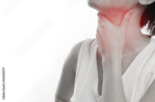 young woman having Sore throat on  isolated white background.  concept of health care lifestyle.