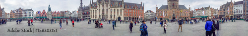 BRUGES, BELGIUM - MAY 2015: Tourists along city streets. The city is a famous attraction in Belgium