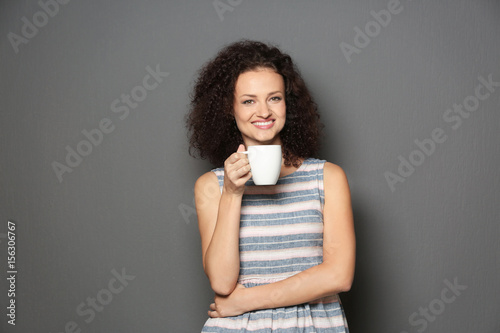 Young attractive woman hold...