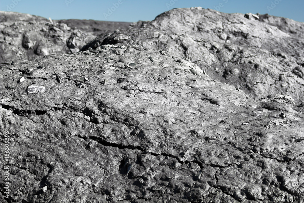 waste of the processing of oil shale - shale sand shot close up and looks like on the surface of the moon. waste of the processing of oil shale - shale sand shot close up and looks like on the surface of the moon.