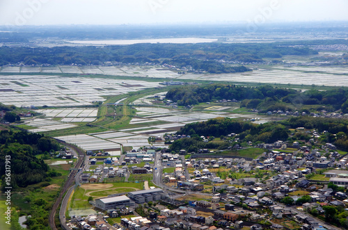Canvas Print Aerial view of the Tokyo suburb and organized farmland