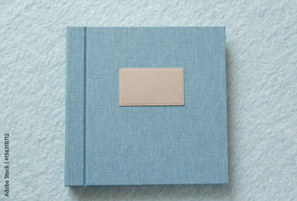 Fototapeta premium Blue book with fabric cover