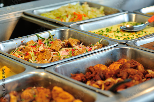 Obraz na plátně Steel tray filled with food inside the self service Chinese restaurant