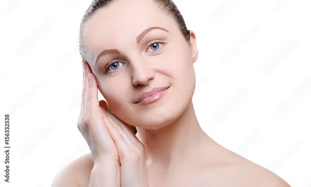 Portrait of a girl with nude make-up with hands near her face isolated on white background. Girl with clean healthy skin on white. Cosmetology, spa, medicine, beauty care. Beauty model. Nude makeup Portrait of a girl with nude make-up with hands near her face isolated on white background. Girl with clean healthy skin on white. Cosmetology, spa, medicine, beauty care. Beauty model. Nude makeup
