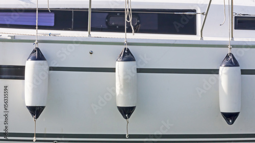 Sailboat side with fenders