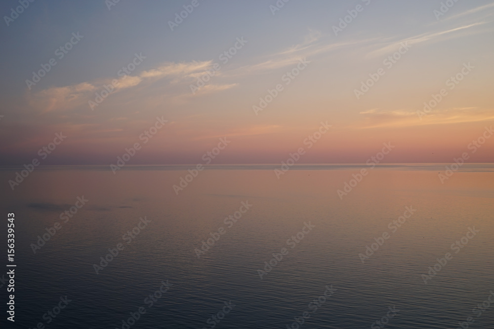 Delicious delicate sunset over a calm sea