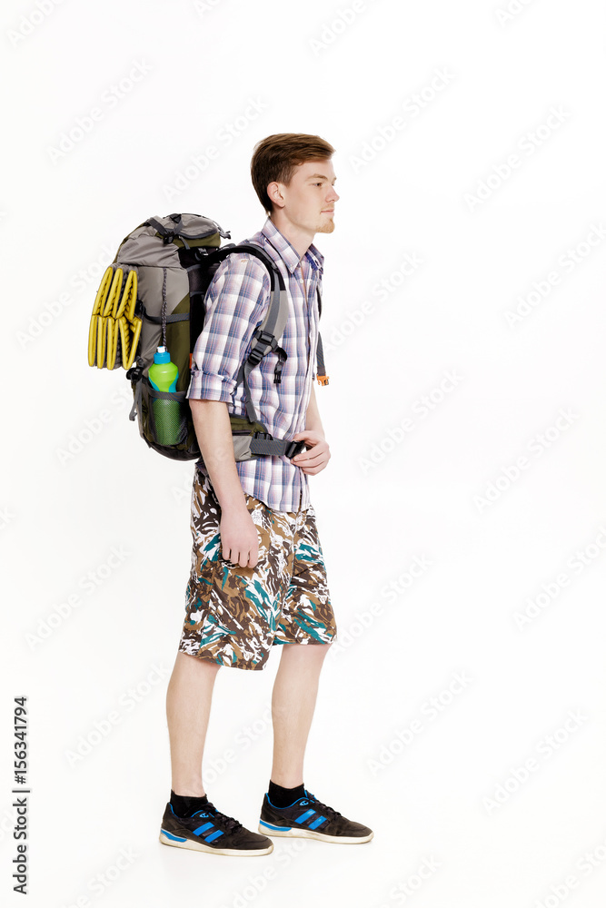 Young hiker with backpack on white background Young hiker with backpack on white background