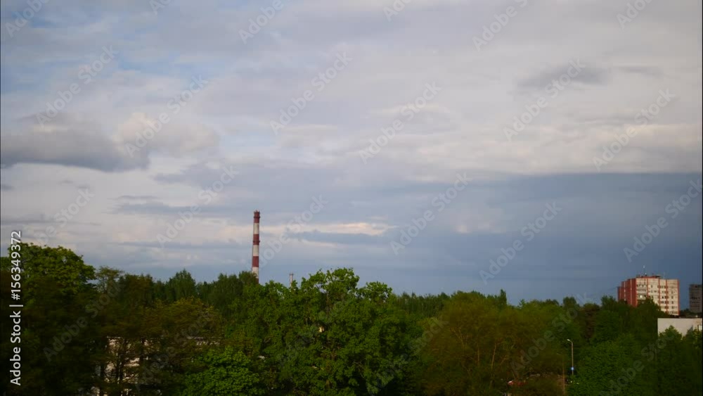 Sunset Time Lapse Sky and moving clouds Power Plant pipe with smoke Latvia 4K Sunset Time Lapse Sky and moving clouds Power Plant pipe with smoke Latvia 4K