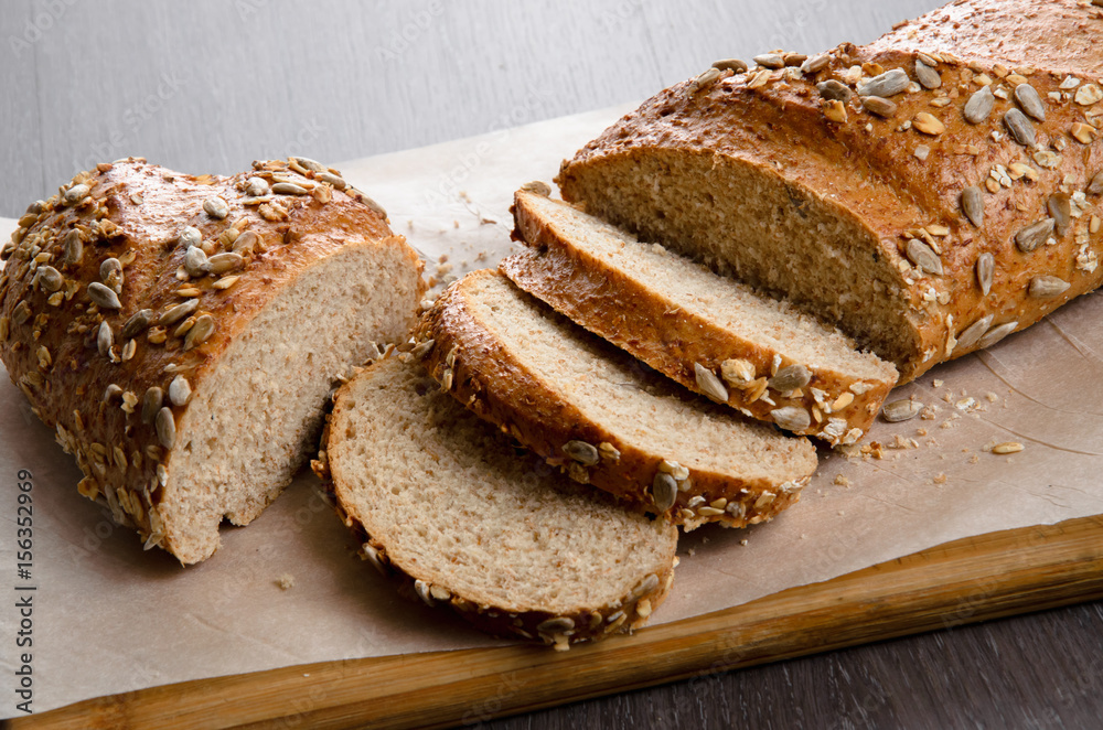 Home made bread on wooden table Home made bread on wooden table