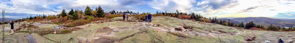 ACADIA NP, MAINE - OCTOBER 2015: Tourists visit national park. Acadia is a major destination in foliage season