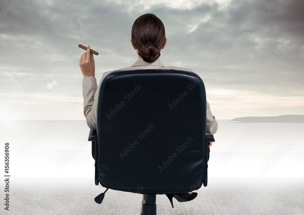 Fototapeta premium Businesswoman Back Sitting in Chair with cigar and ocean view