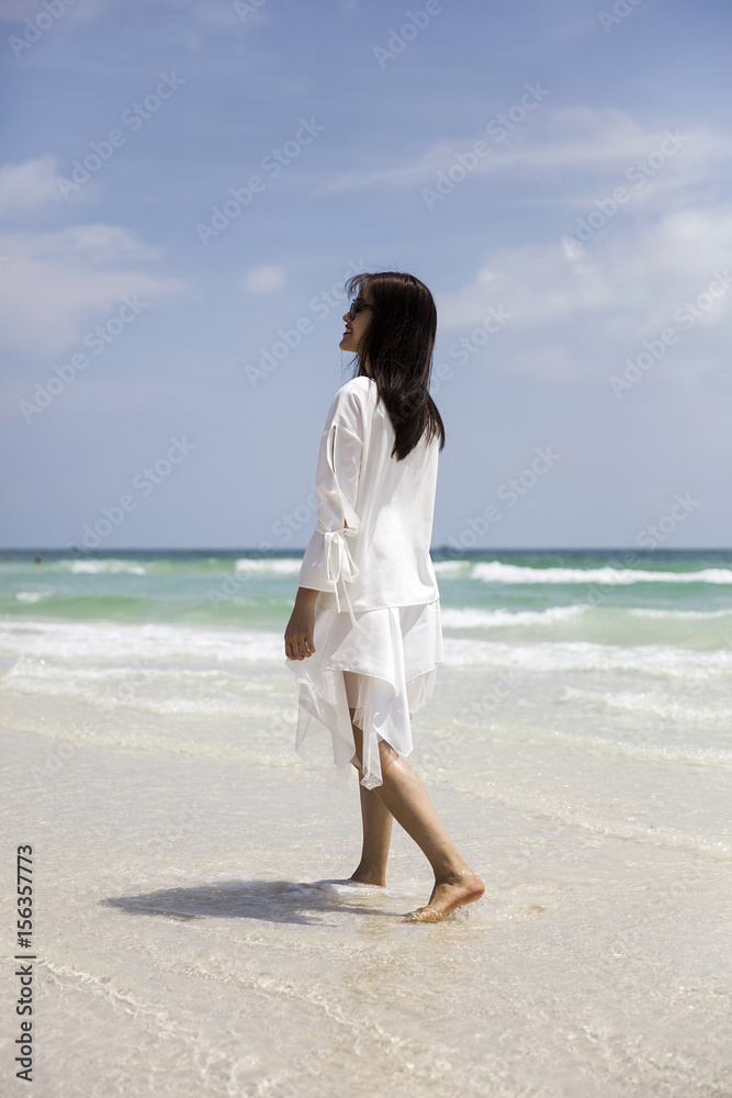 Young Vietnamese woman on the beach