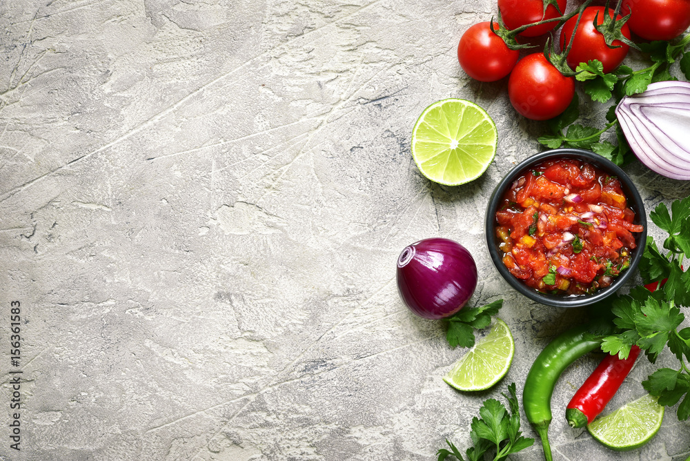 Ingredients for making tomato salsa (salsa roja).Top view with copy space. - obrazy, fototapety, plakaty 