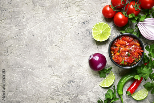 Ingredients for making tomato salsa (salsa roja).Top view with copy space. photo
