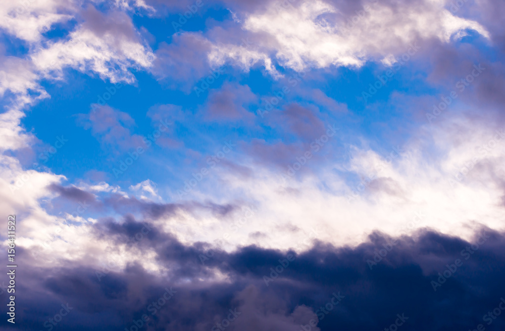 Amazing contrast white and dark clouds and clear blue sky Amazing contrast white and dark clouds and clear blue sky