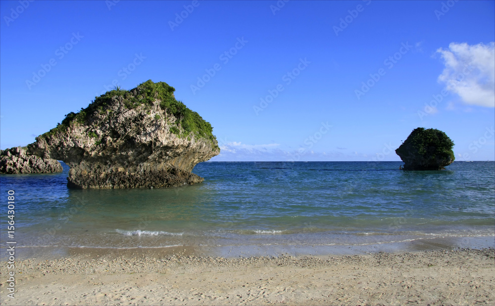 Okinawa island between China and Japan, Japan seaside, blue sea, sky with white clouds and fiords rocks landscape, tourist travel destination, vacation trip, summer time, recreational resort